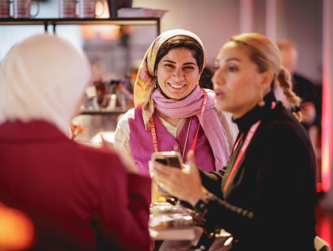 Women networking at the Falling Walls Science Summit 2024.