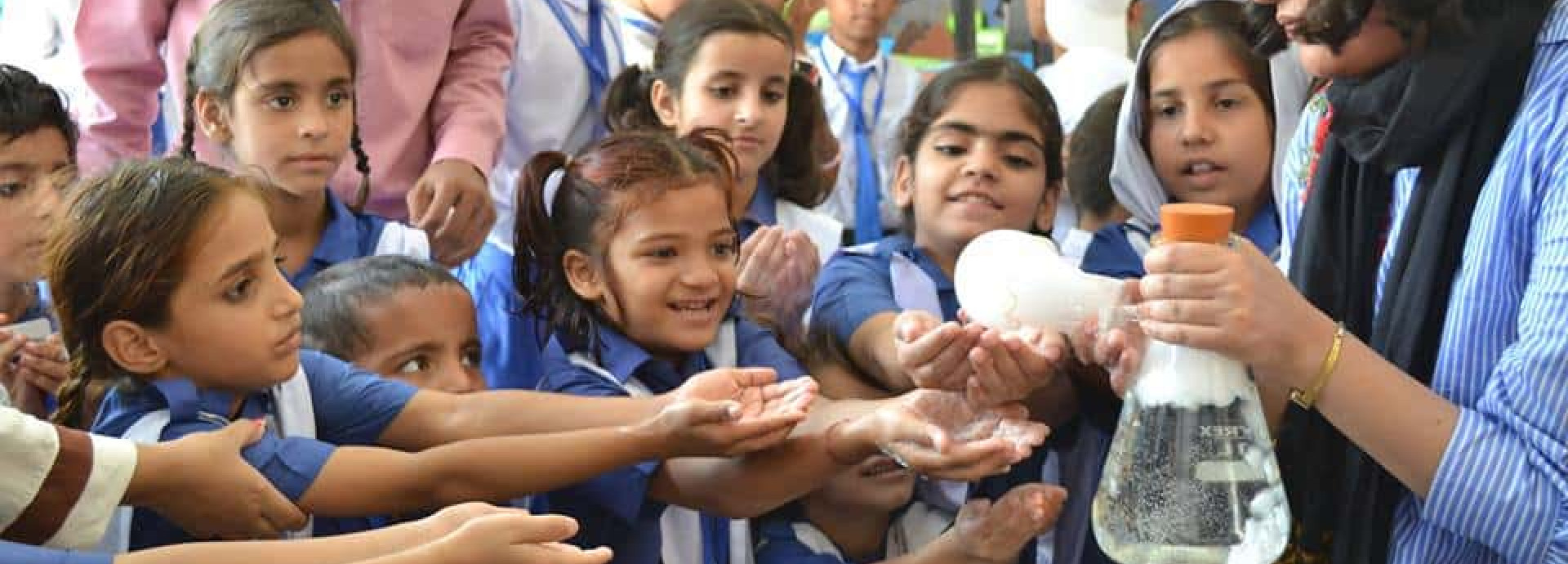 Lalah Rukh is showing the form from erlenmeyer flask to school children