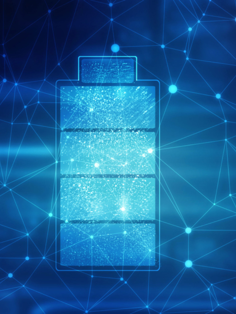 A glowing blue battery icon, showing a full charge with four bars, is centered against a dark blue background. The background is filled with a network of interconnected blue dots and lines, resembling a digital or technological web.