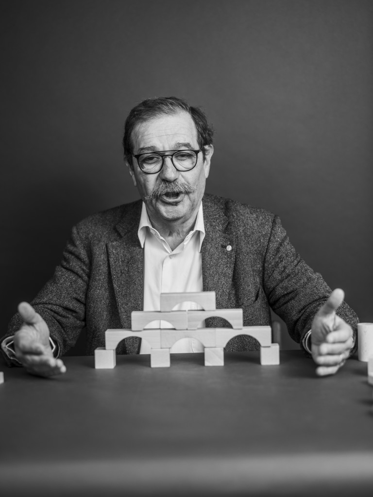 Image of Alain Aspect with building blocks for Falling Walls' Shape the Future campaign