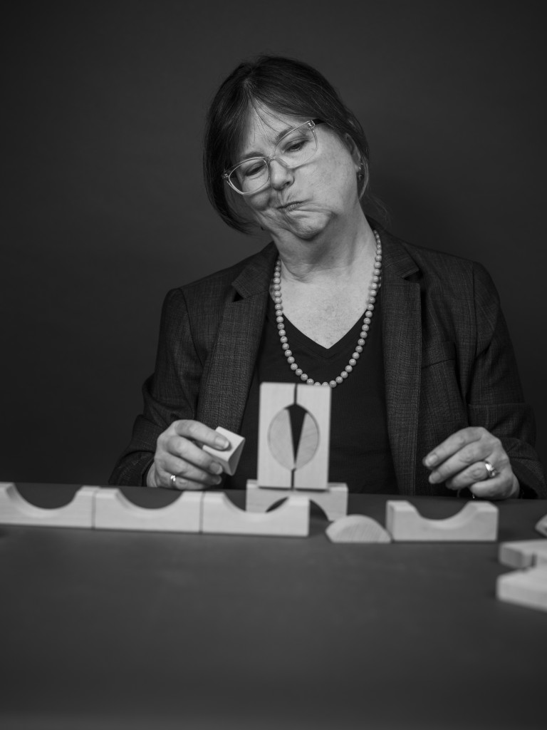Image of Cat Allman with building blocks for Falling Walls' Shape the Future campaign