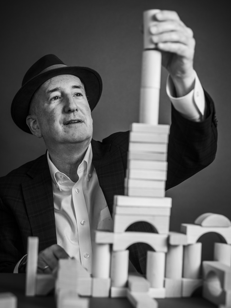 Image of Eric Isaacs with building blocks for Falling Walls' Shape the Future campaign