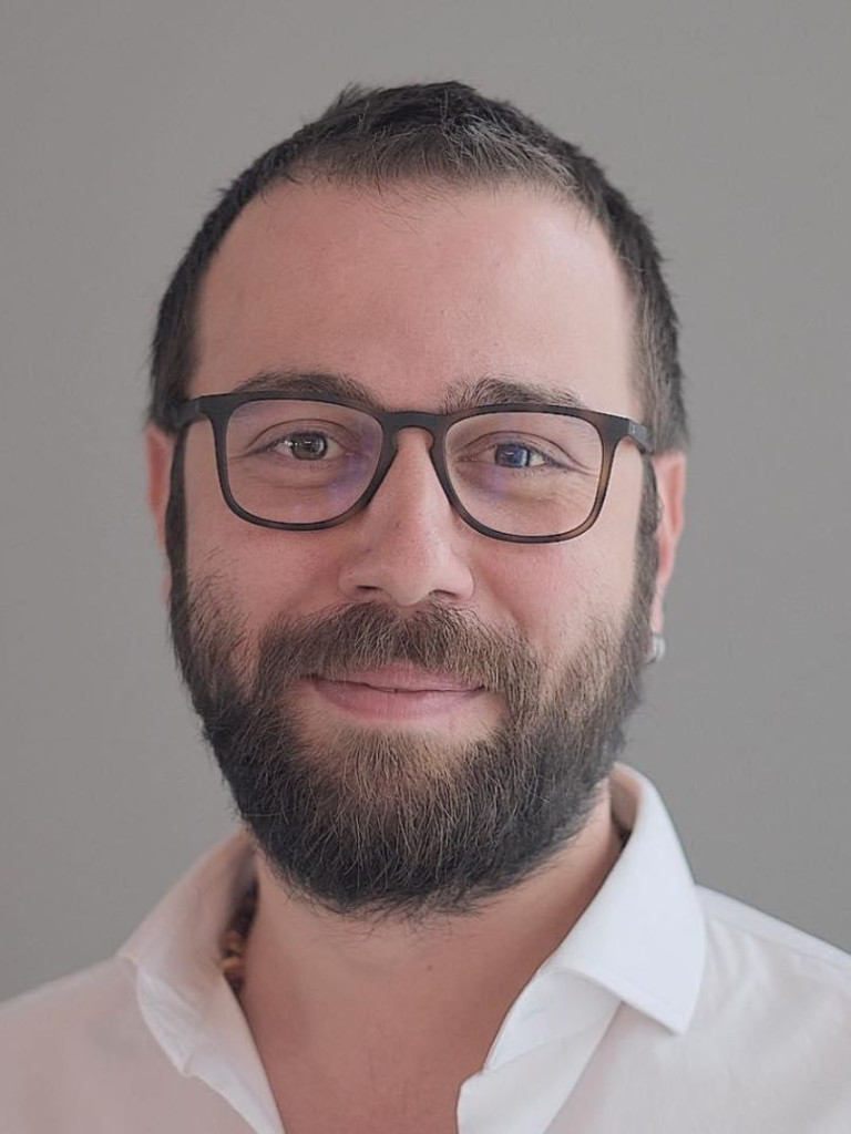 Portrait of Taner Akcok