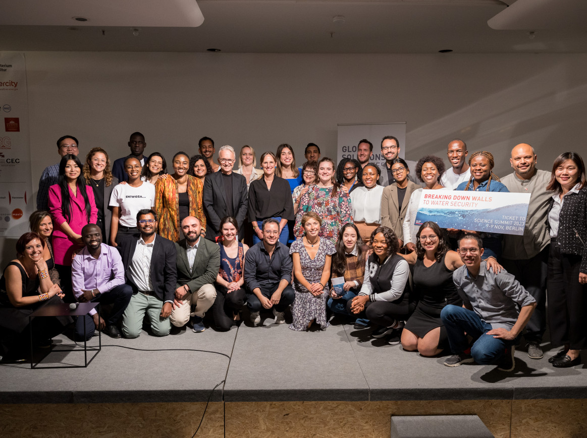 Group picture on stage at Falling Walls Summer School 2023