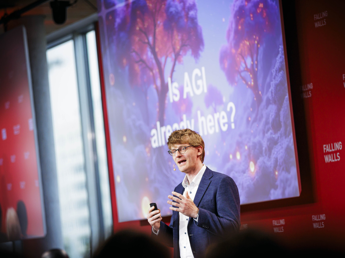 Richard Socher on stage at Faling Walls Science Summit 2024 presenting his research on about Artificial General Intelligence