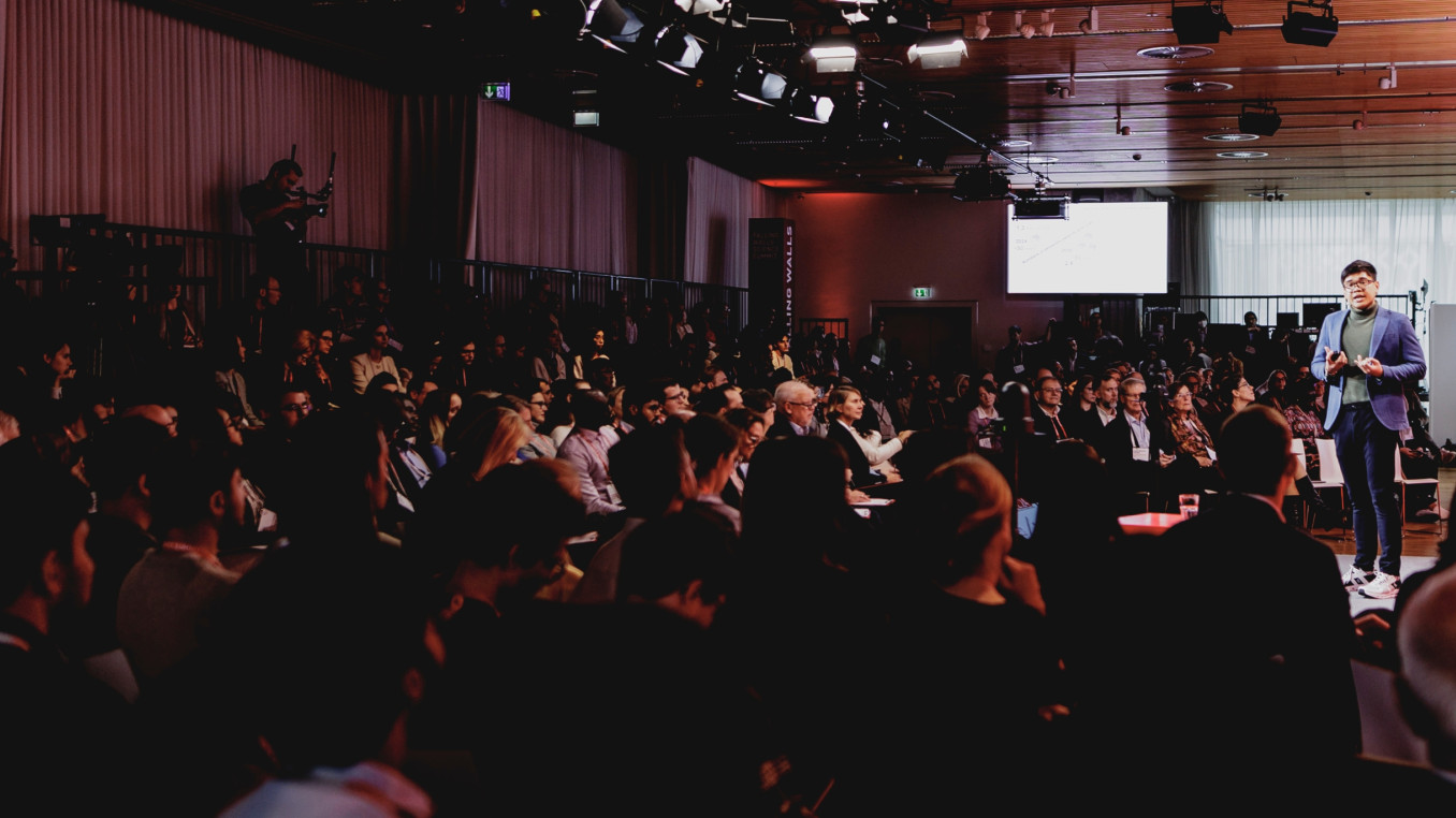 Speaker and audience at the Falling Walls Science Summit
