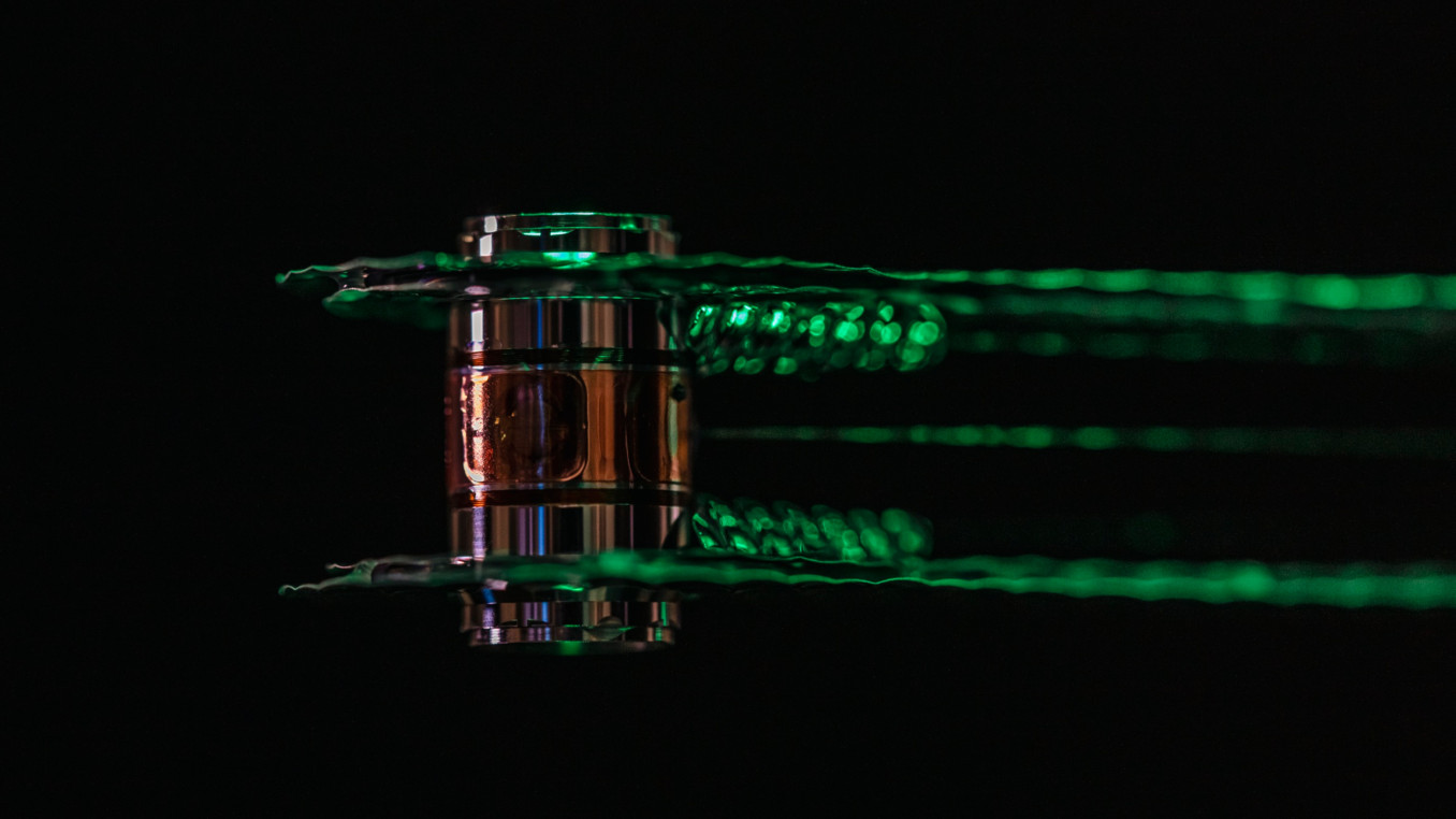 The 192 laser beams of the National Ignition Facility are directed at a gold-plated hohlraum, which houses the tiny fuel capsule