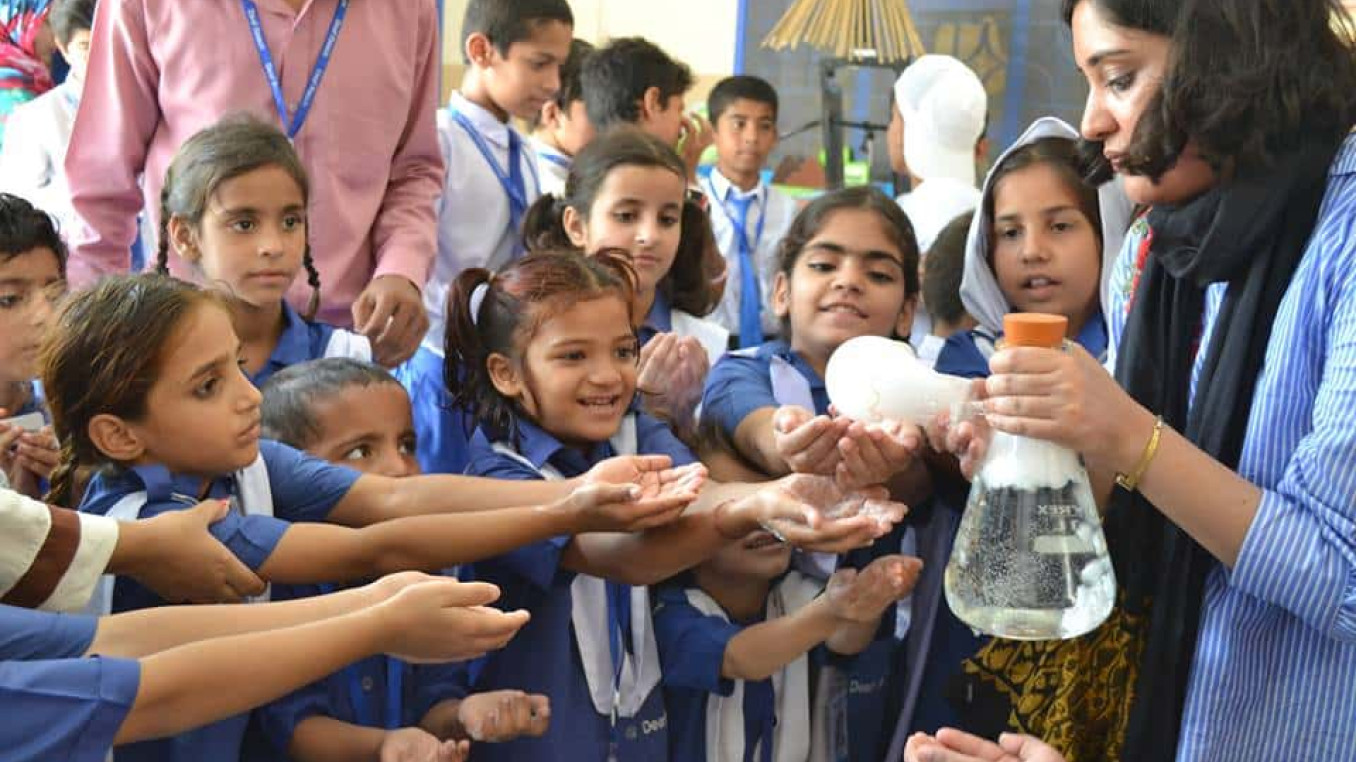 Lalah Rukh is showing the form from erlenmeyer flask to school children