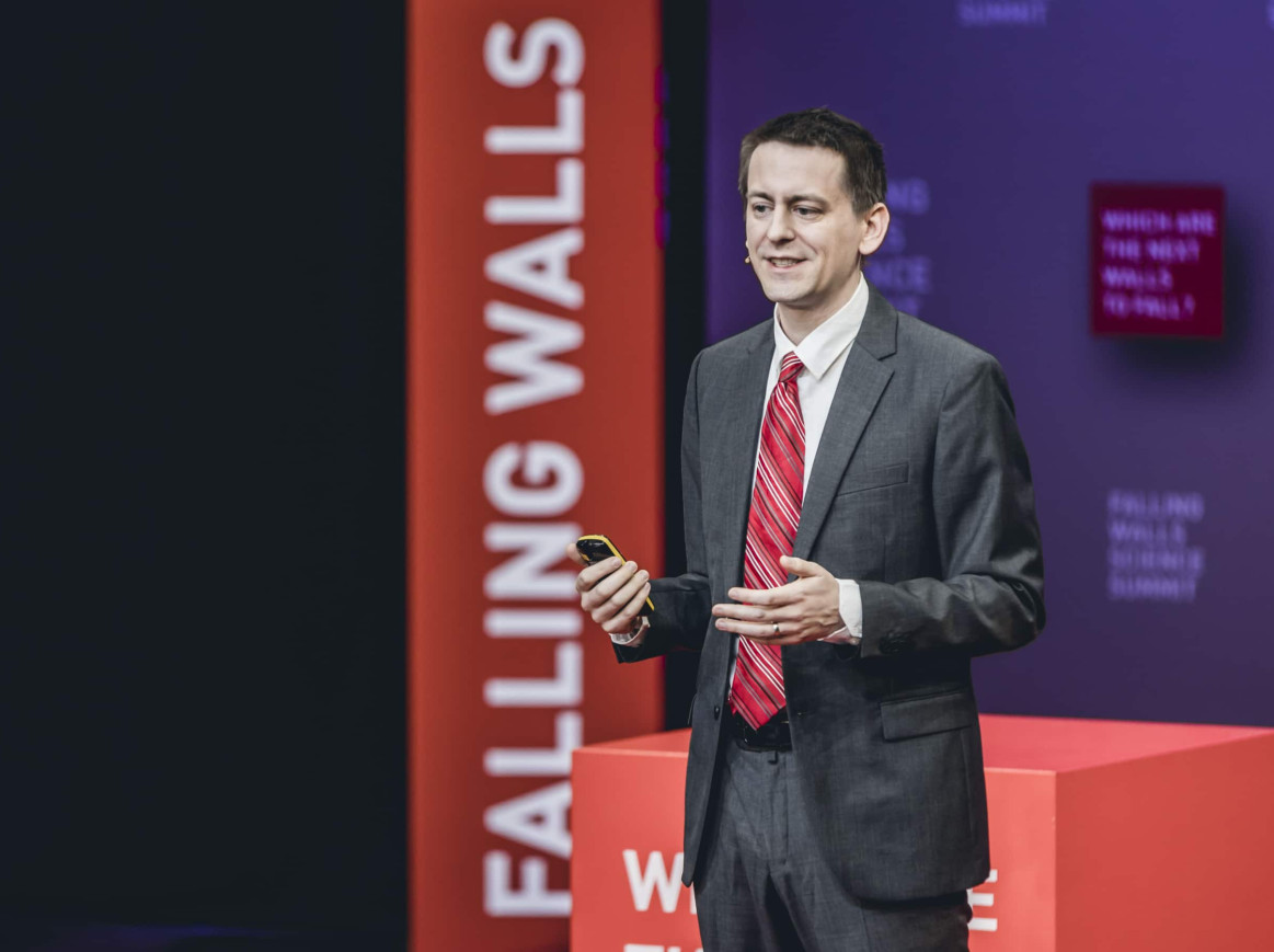 John Jumper on Stage at Falling Walls Science Summit 2022