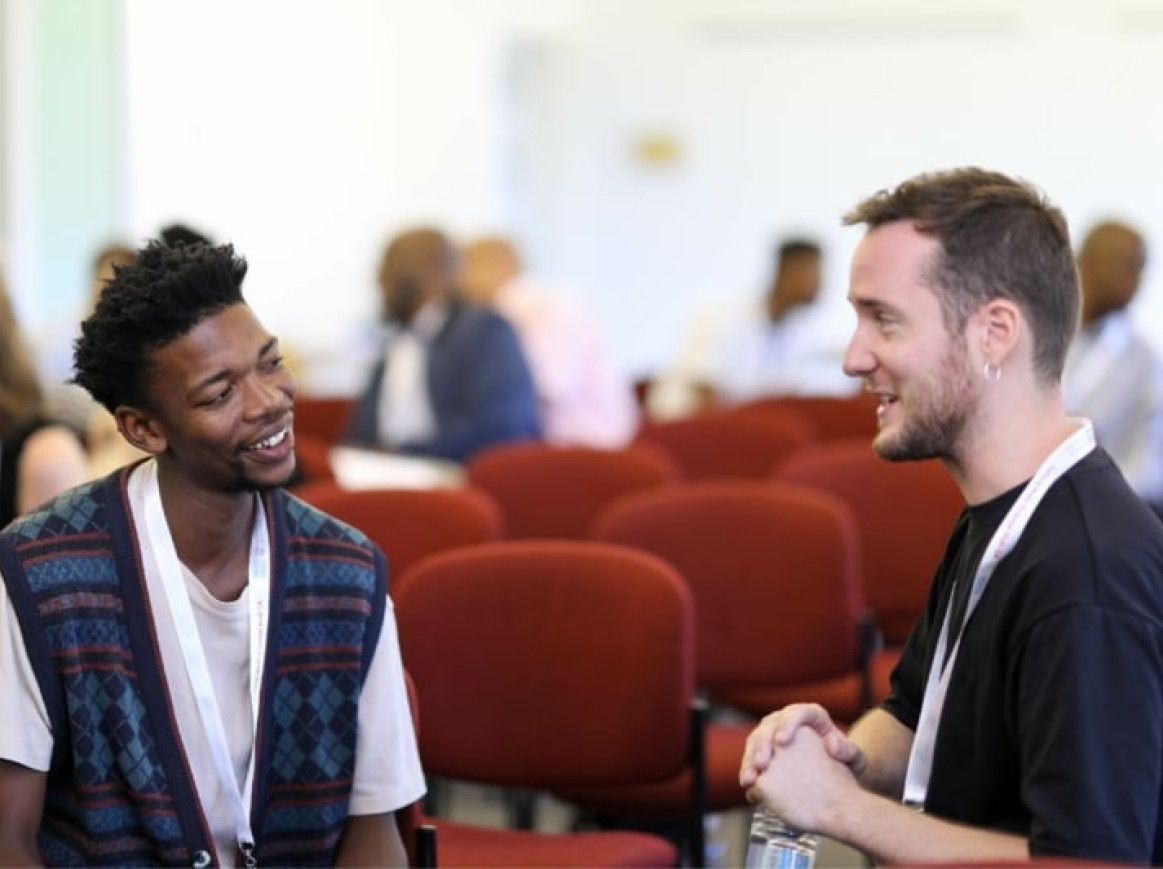 Members of Engage Hub South Africa conversing with one another.